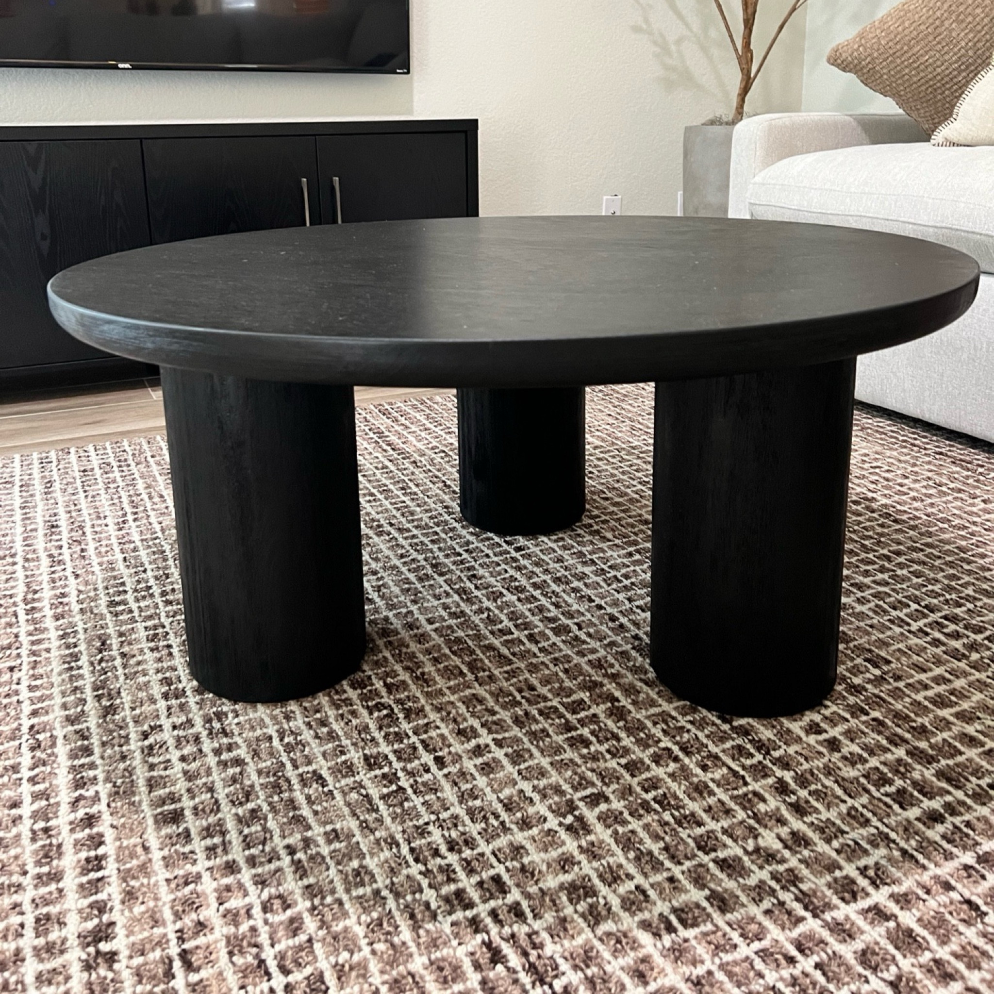 Our favorite black wood coffee table! I love the chunky legs and black wood grain on this gorgeous table! Inspired by a West Elm table that is over double the price! 
•••
Affordable furniture, budget furniture, living room furniture, coffee table, round coffee table, black coffee table, 40 inch coffee table, large coffee table 

#LTKHome #LTKStyleTip