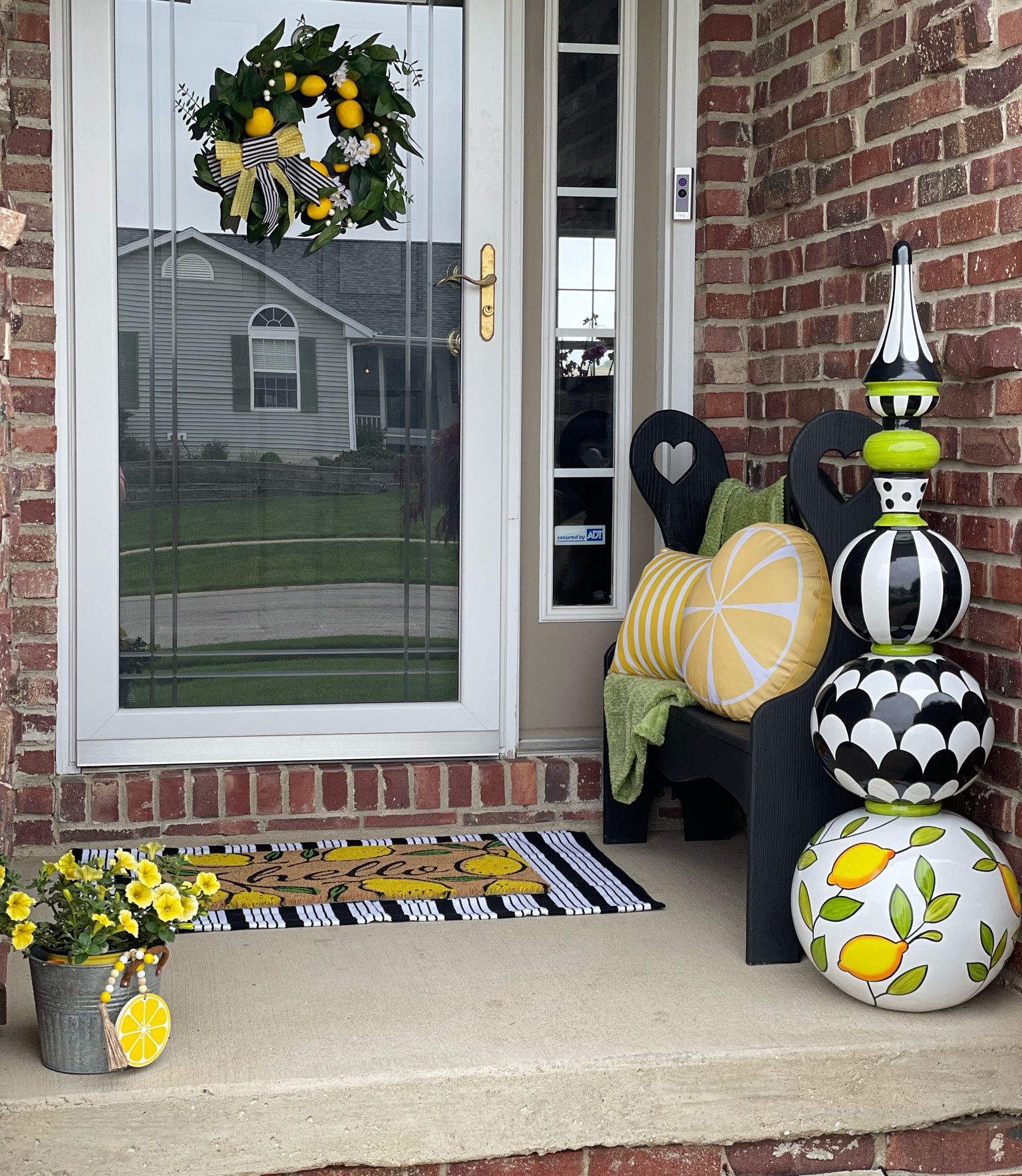 Lemon inspired front door decor with black and green accents  

#LTKunder50 #LTKhome #LTKSeasonal