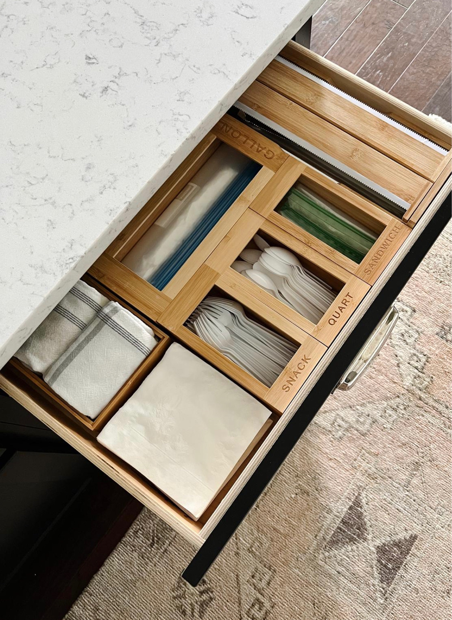 Time to get those kitchen drawers organized before the kids are back to school!  These bamboo organizers for food storage bags and foil/plastic wrap made getting school lunches ready so much easier.

TIP:  they also work well for storing plastic forks and spoons.



#LTKhome #LTKFind #LTKBacktoSchool