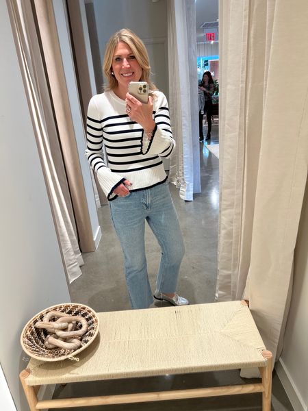 Ivory navy striped sweater. Darling cuff detail. Little peplum. Fitted style. I sized up for a roomy fit. Light wash cropped slim denim with flare. Great fit. Tts. 

#LTKover40 #LTKworkwear #LTKSeasonal