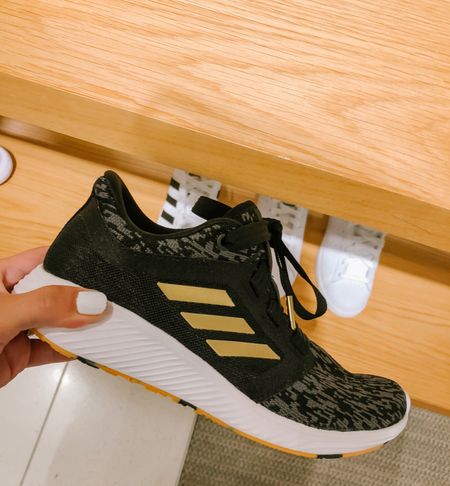 Adidas sneakers are the best. This gold pair aren’t available, but here are some similar pairs that I really like. 
Sneakers 
Adidas 


#LTKfindsunder100 #LTKsalealert #LTKfitness