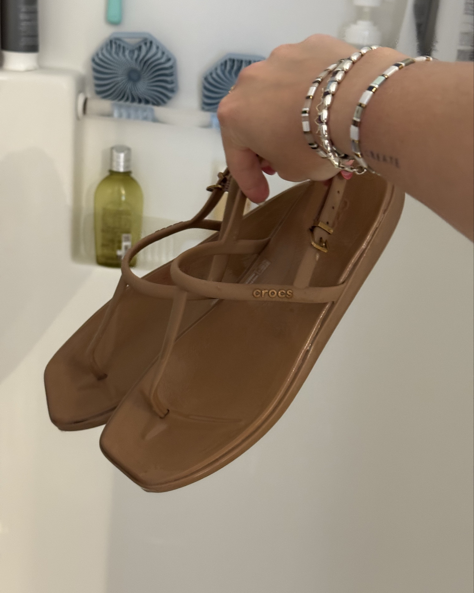 Obsessed with these crocs sandals that I can walk off the beach and straight into the shower to get the sand off of them 😂 

#LTKSwim #LTKTravel #LTKShoeCrush