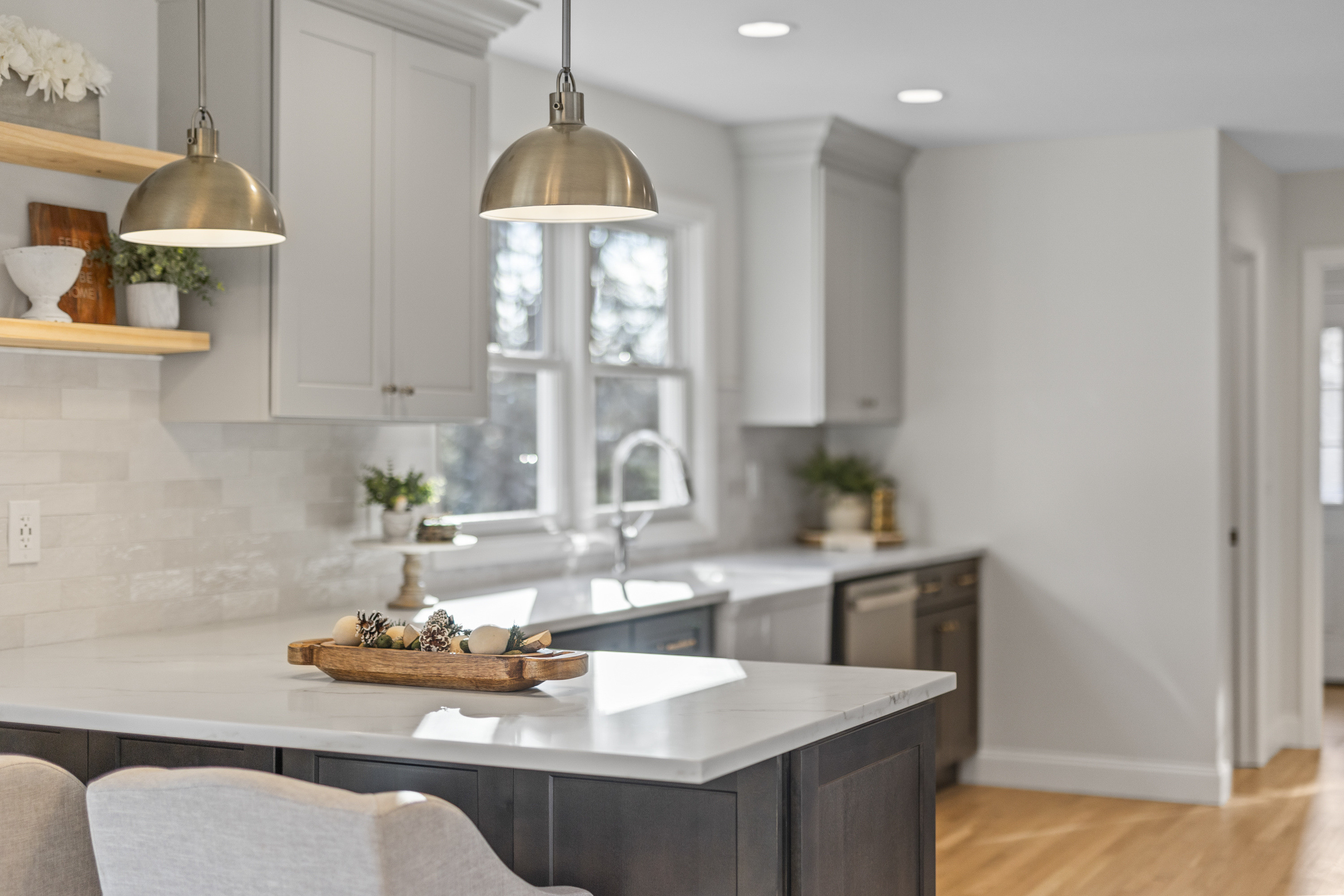 Brass pendant lighting  + chrome plumbing - love the mixed metals