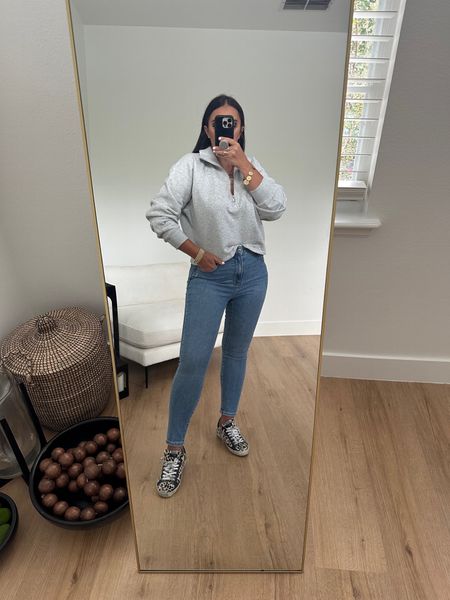 Quarter Zip Boxy Fleece Sweatshirt wearing size medium. Abercrombie & Fitch High Rise Super Skinny Ankle Jean wearing size 29. 
