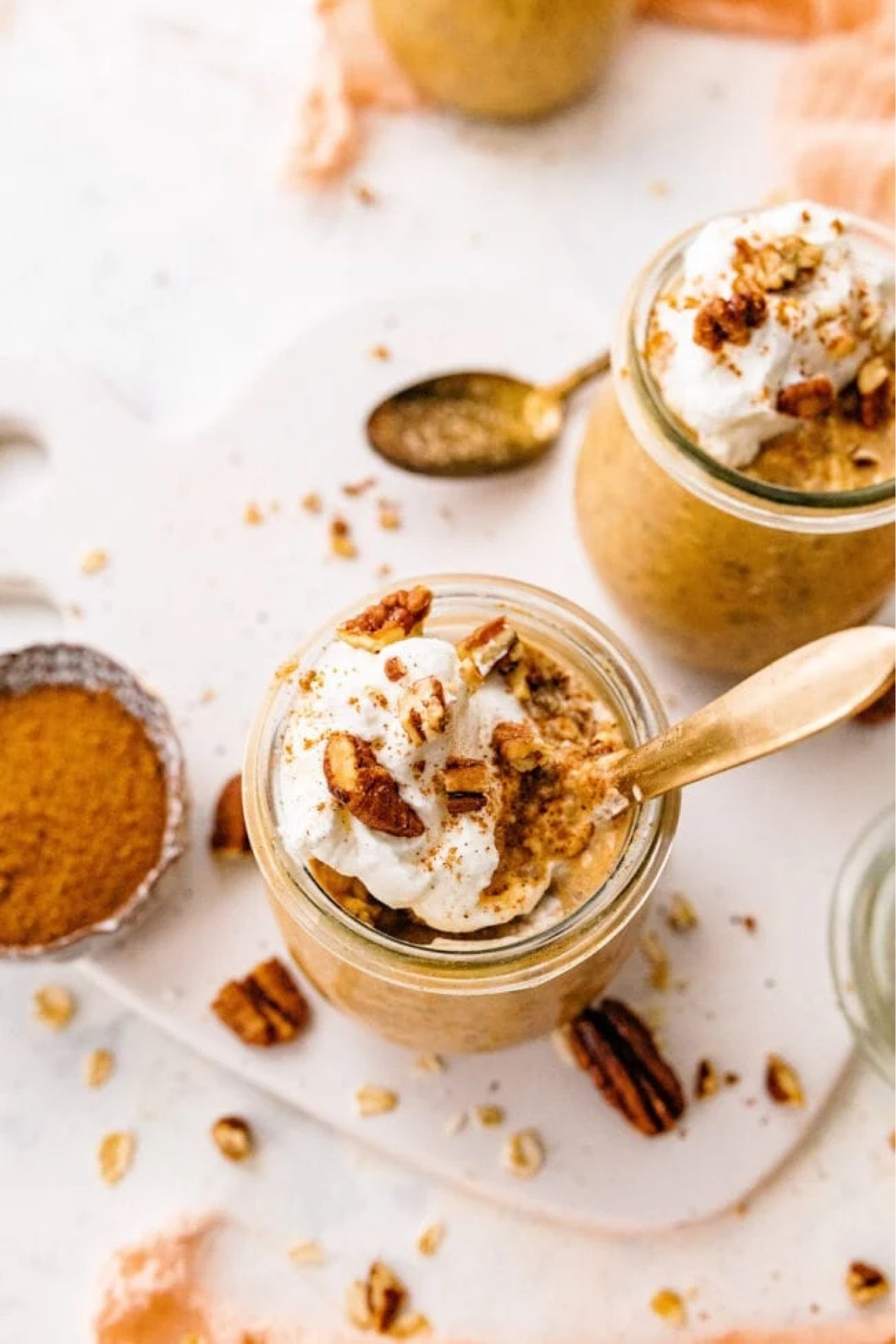 Pumpkin Overnight Oats - creamy overnight oats that will remind you of pumpkin pie. The oats only take a few minutes to make and will be waiting for you in the fridge in the morning! A great meal prep breakfast that is healthy and delicious. 

#LTKSeasonal #LTKHome #LTKHoliday