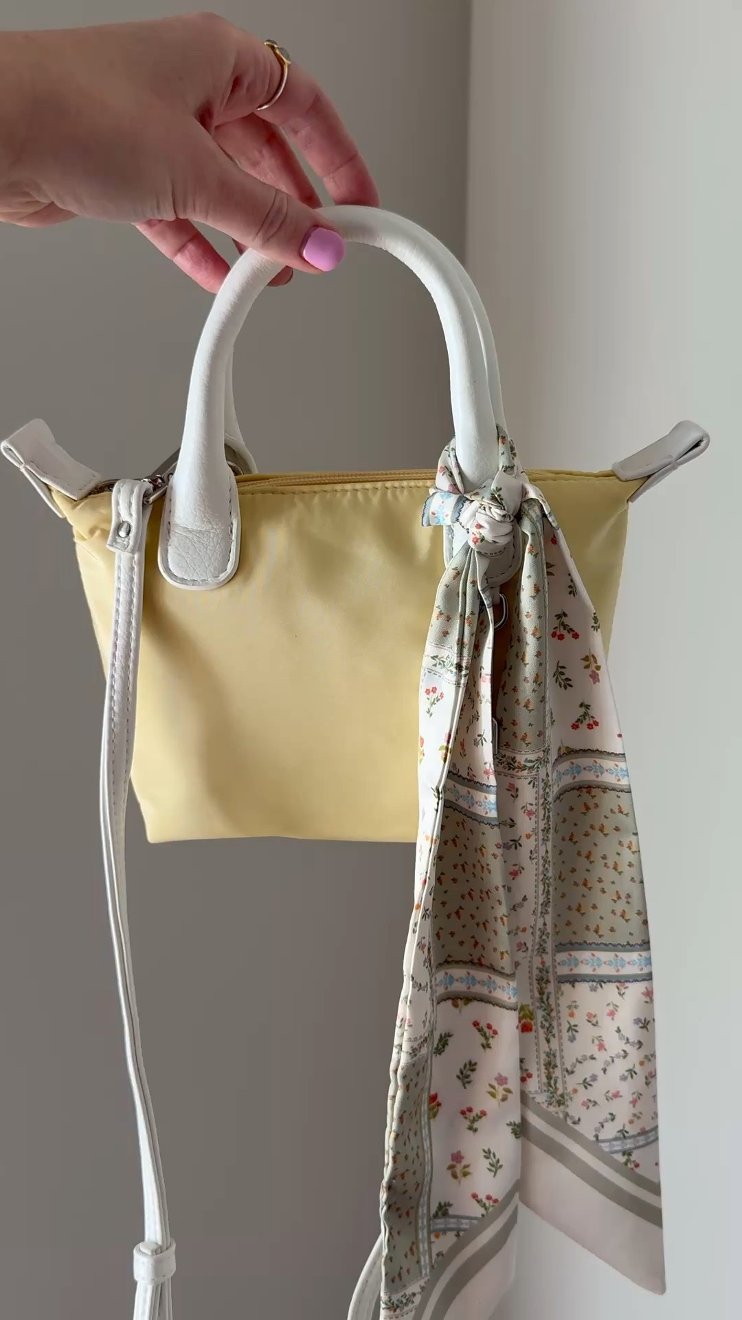 The CUTEST little mini bag and scarf! Big enough to hold my iPhone pro, lipgloss sunglasses and card holder and under $20!

Mini bag, yellow bag, Walmart find, summer style, bag scarf 