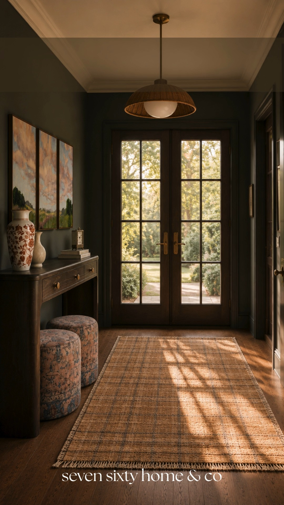 This entryway feels warm and dramatic in the best way with its deep charcoal walls, natural light, layered textures, and timeless furnishings. Spaces like this always remind me how much impact a thoughtfully styled foyer can have before you even step fully into the home.

moody foyer inspiration, dark transitional interiors, warm entryway decor, cozy luxury home, black wall interiors, designer inspired entryway, collected foyer styling, warm wood accents, layered neutral decor, elegant home entrance, traditional modern home decor, cozy transitional aesthetic, woven runner rug, timeless interior styling, warm ambient lighting, elevated entryway inspiration, moody elegant interiors, luxury foyer ideas, collected home decor, warm gathered interiors 

 #LTKHome #LTKSaleAlert