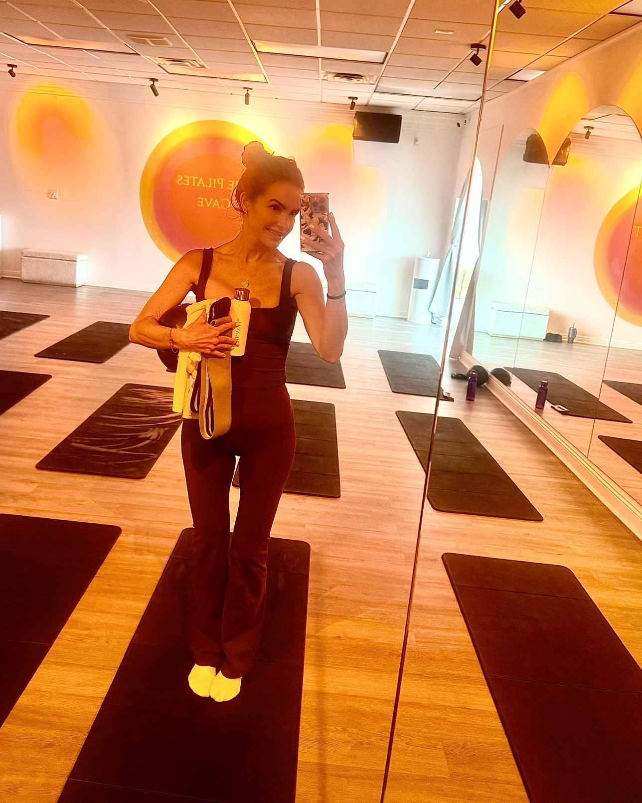 2 days in a row arden & i starting out our day with the pilates cave🍄‍🟫 such fun & good wkouts! 

shop my fav flares & matching tank by one of my favs the fit is super flattering & fabric do comfy too! 

@Shop 437

#LTKTravel #LTKActive #LTKfitnessgoals