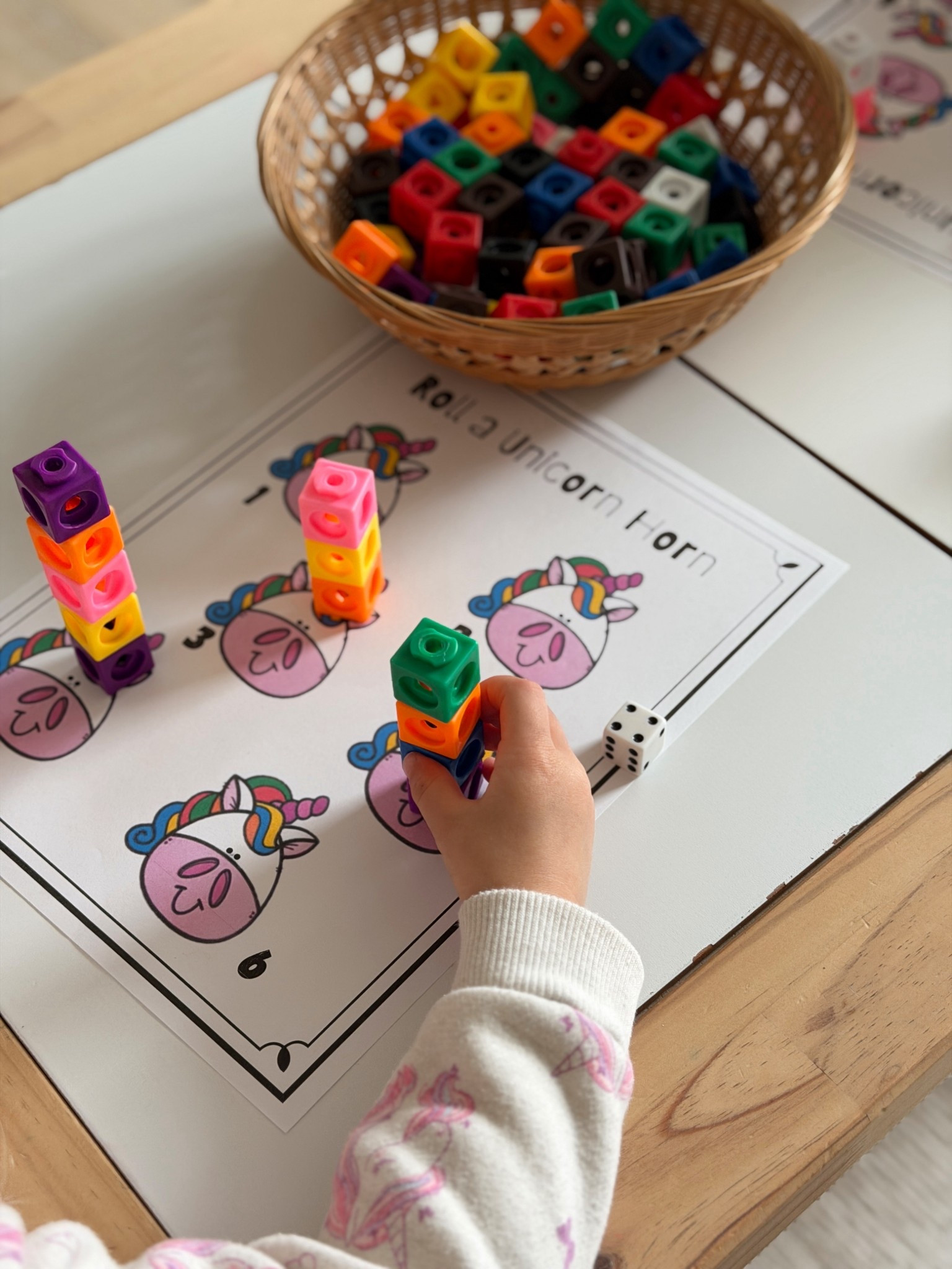 Unicorn math game 🎲🦄 
--worksheet can be found on teachers pay teachers 

#LTKmomlife #LTKKids #LTKstorytime