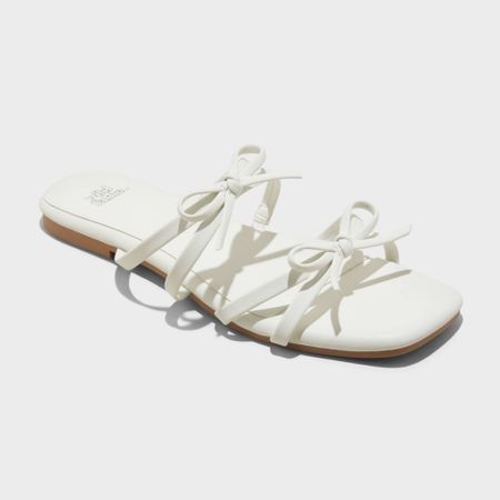 Target white sandals 

#LTKfindsunder50 #LTKstyletip #LTKsalealert #LTKtravel #LTKSeasonal