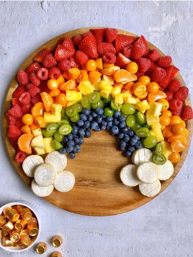 It’s not St. Patrick’s Day without rainbows, which is why I made this rainbow fruit tray–perfect for hiding pots of gold (cheese)! – When it comes to this cheery fruit board, there are two ways to organize it, but no matter how you spin it, it’s a colorful way to celebrate on March 17th. For more of a classic green theme, try my Green Paddy’s Day Snack Board.

#LTKfoodie #LTKHome #LTKSeasonal