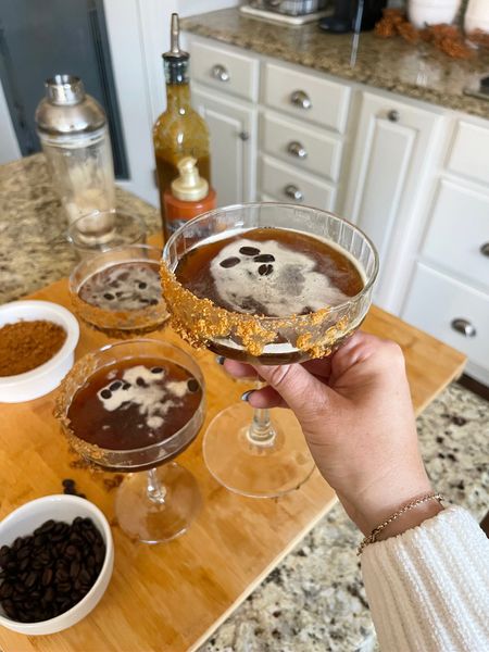 PUMPKIN SPICE ESPRESSO MARTINI

2 oz vodka
2 oz kahlua
4 oz coffee or espresso
1 oz pumpkin spice syrup (recipe below)
Caramel sauce & crushed graham cracker for rim

Combine all ingredients in cocktail shaker & shake over ice. Rim glasses with caramel & cracker, pour, cheers!

Homemade Pumpkin Spice Syrup (for cocktails or coffee!)

1 cup water
3/4 cup pumpkin purée 
1/2 cup brown sugar
1 tbsp pumpkin pie spice
Combine in saucepan & bring to boil, reduce & stir occasionally for 5-7 minutes.

Halloween party, halloween drink, halloween party, halloween hosting, drink recipe

#LTKparties #LTKhome #LTKHalloween