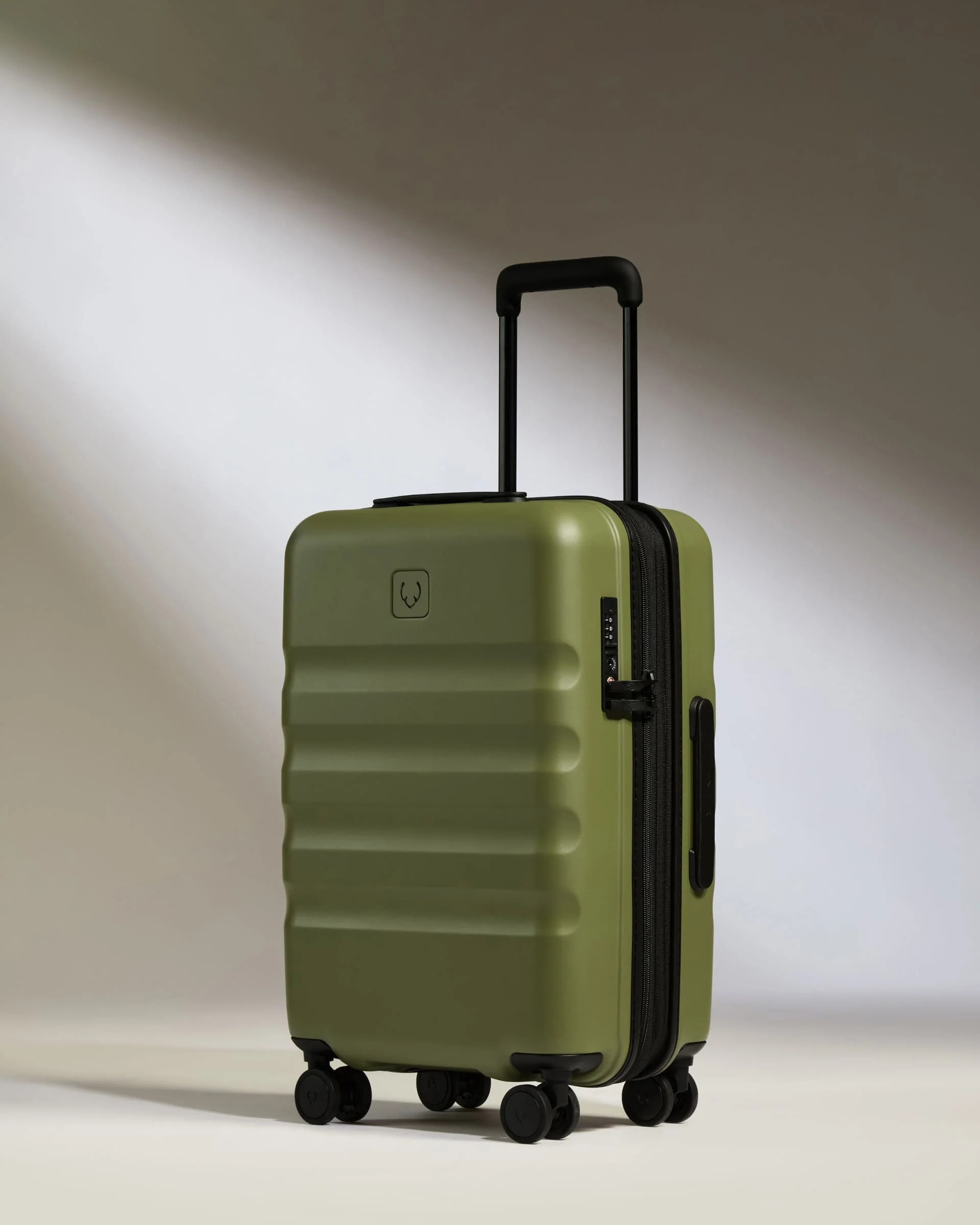 Icon Stripe Cabin with Expander in Green | Lightweight & Hard Shell Suitcase | Antler UK