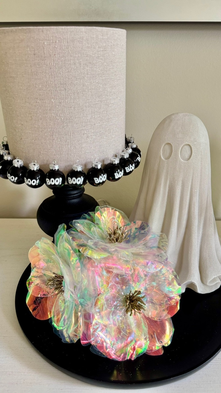 Spooky chic meets iridescent glam 👻✨ Loving this BOO-tiful blend of ghostly charm and shimmering blooms! 🖤🌸

#SpookyChic #BooCrew #HalloweenVibes #GlamGhoul #HauntedHomeDecor #BooBeautiful #GhostlyGlam #ShimmerAndSpook #HalloweenStyle #SpookySeason #HauntedElegance #TrickOrTrend #IridescentDecor #SpookyButMakeItCute #HalloweenInspo

#LTKParties #LTKSeasonal #LTKHome