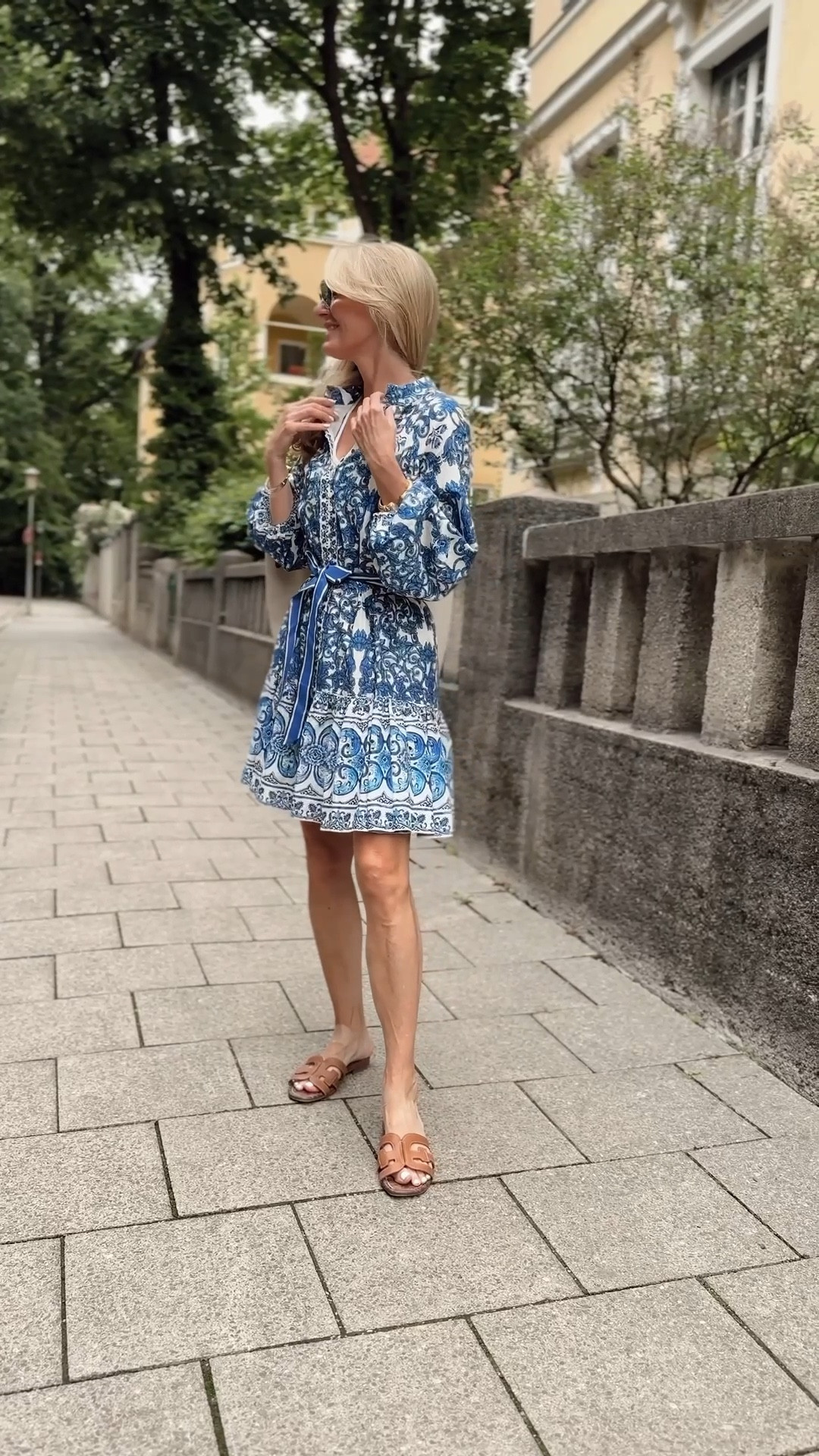 This gorgeous blue and white dress from Dillards is such a pretty high-coverage option for summer. It’s very lightweight and breathable with so many beautiful and functional details. Fit runs true to size. 

~Erin xo 

#LTKWedding #LTKSeasonal #LTKTravel