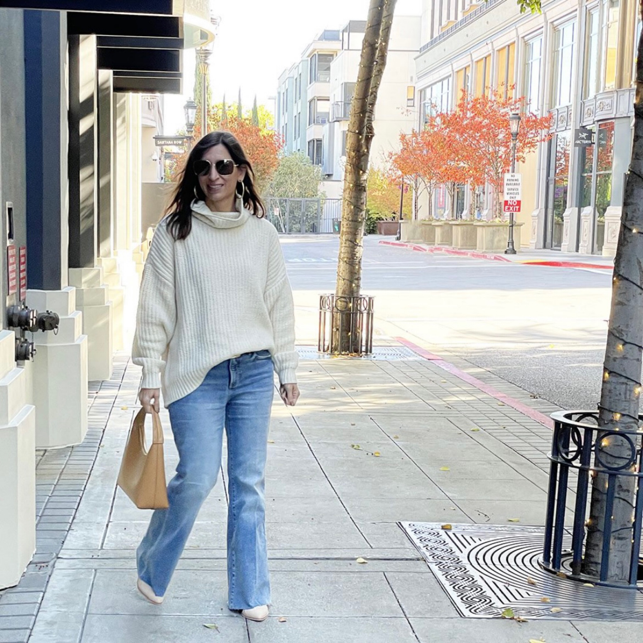 Love a cozy sweater and flare jeans this time of year 🙌❤️

#LTKstyletip #LTKunder100 #LTKitbag