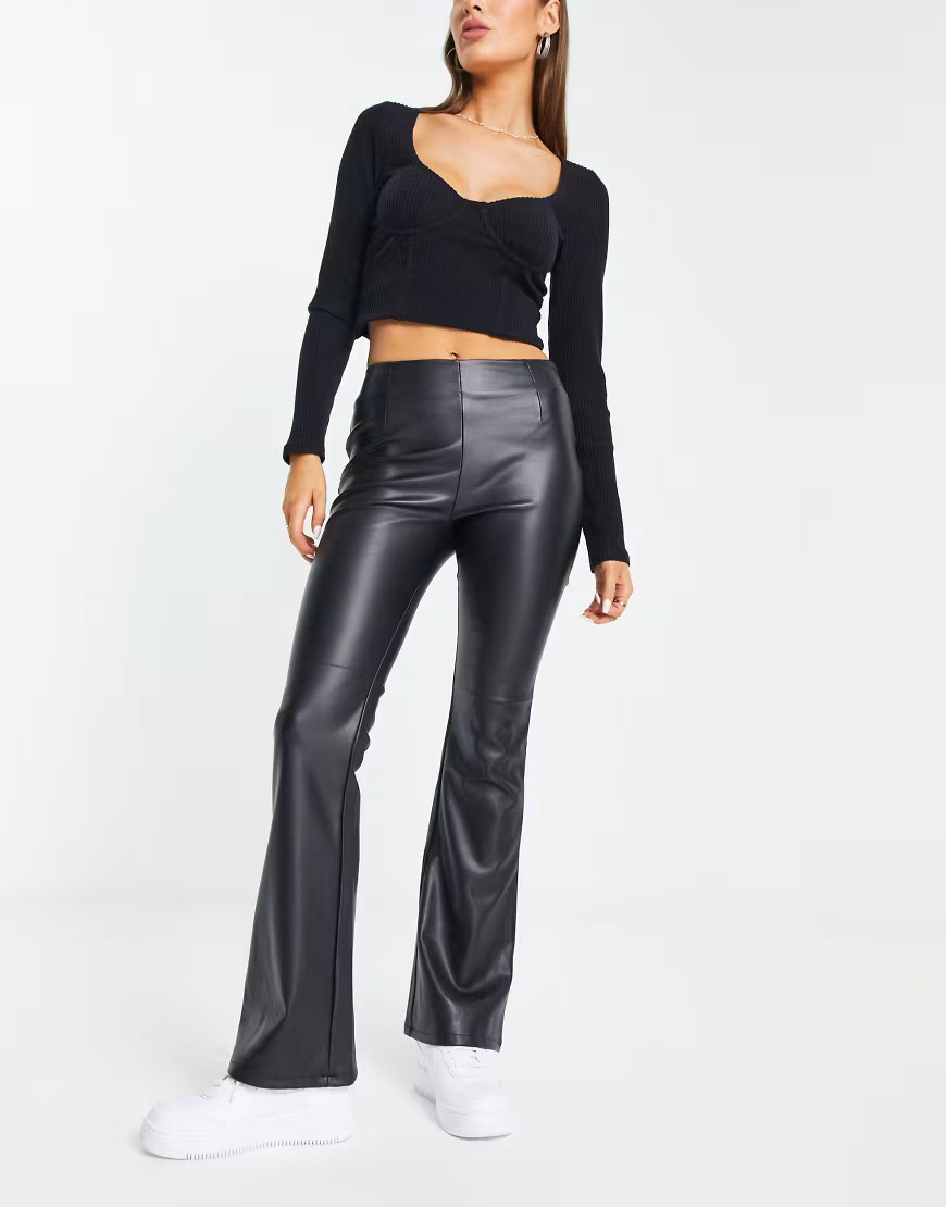 ASOS DESIGN stretch faux leather flare pants in black | ASOS (Global)