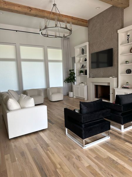 Living room decor: black velvet chairs, white boucle swivel chairs 

#LTKhome