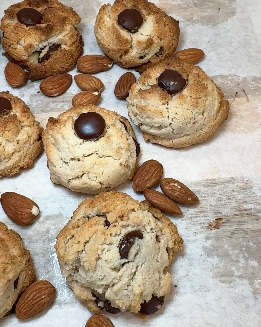 
🍪 5-Ingredient, No Egg, No Dairy, Chocolate Chip Cookies! 🍪

You won’t believe how easy it is to make these delicious almond flour chocolate chip cookies! They’re vegan, gluten-free, and grain-free, with a perfectly chewy texture. Best part? It’s Super easy to make and packed with healthy fats. 

Ingredients 2 cups Almond Flour - (note 1) ⅓ cup Maple Syrup - (note 2) ¼ cup Coconut Oil - melted, cooled (note 3) ½ teaspoon Baking Powder ½ cup Vegan Dark Chocolate Chips - (note 4)
Optional ¼ teaspoon Salt
1 teaspoon Vanilla Extract

Instructions:

	1.	Preheat oven to 350°F (180°C) and line a cookie sheet with oiled parchment paper.
	2.	In a large bowl, mix almond flour, baking powder, maple syrup, coconut oil, vanilla, and salt.
	3.	Stir until dough forms, then fold in chocolate chips.
	4.	Roll dough into 12 balls (oil hands if sticky) and place on the sheet with space between each.
	5.	Bake for 12-15 minutes until edges are golden.
	6.	Cool on the sheet for 10 minutes, then transfer to a wire rack to cool completely.

#LTKKids #LTKParties #LTKVideo