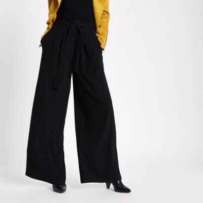 Black belted wide leg trousers | River Island (UK & IE)