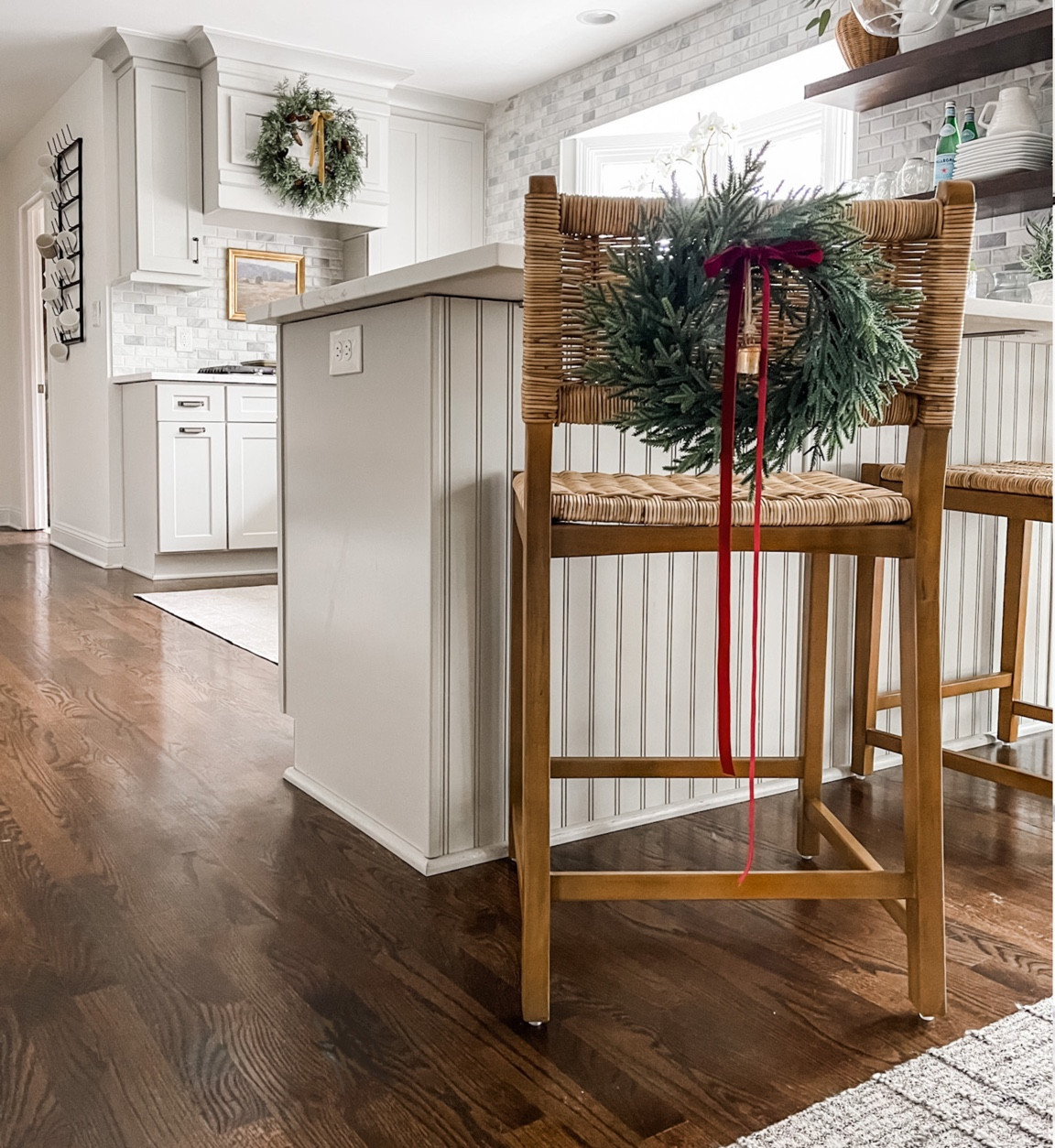 Gave this mini wreath a facelift and love how it turned out on our counter stool! 

#counterstool #rattanstool #wreath #miniwreath #budgetwreath #velvetribbon #vintagebells 

#LTKHoliday #LTKSeasonal #LTKhome