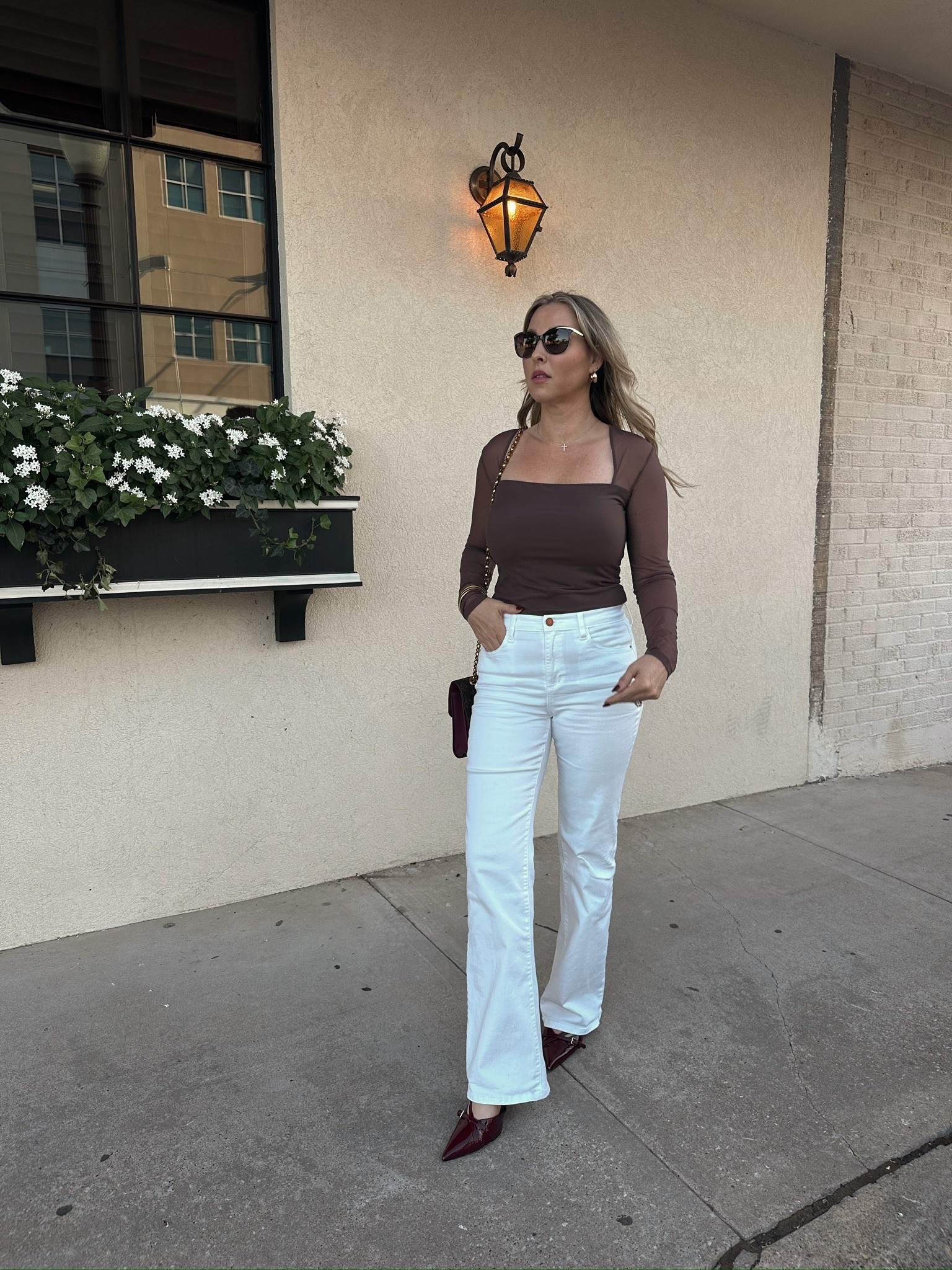 I love this sheer sleeve top so much! It is perfect for a lunch with friends or even a dinner date! It comes in so many more colors, but I love the espresso brown. I am wearing it here with some white flare jeans, slingback pointy heels, sunglasses and one of my fave LV handbags. All items linked ⬆️

#Itkcreator #Itkfinds
#Itkwatchnow #amazon #amazonfinds #fall #falloutfit #fallfashion #datenight #dinnerdateoutfit #dateoutfit

#LTKFindsUnder100 #LTKSeasonal #LTKStyleTip