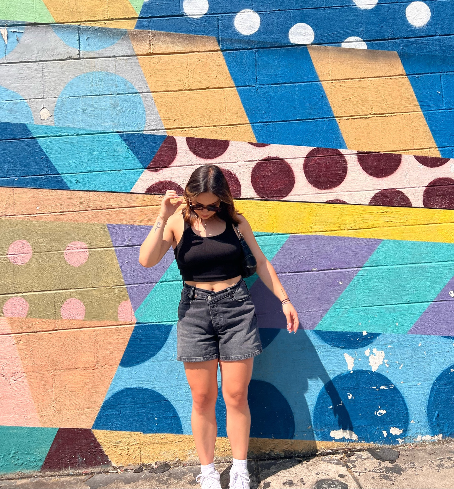 Easy Summer outfit for walking around in the city. Black dad shorts from Abercrombie, with a black tank top from Dynamite, and sunglasses from Oak and Fort. Paired with White Air Force 1’s. 

#LTKfit #LTKtravel #LTKstyletip