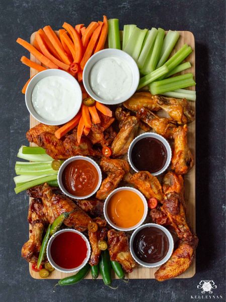 I dressed up this wing grazing board with all the sauces and carrot and celery sticks, of course! It’s the perfect party platter for any event or happening. charcuterie board cheese board entertaining idea pool party Father’s Day party food chicken wing Buffalo wing summer party

#LTKhome #LTKfamily #LTKunder50