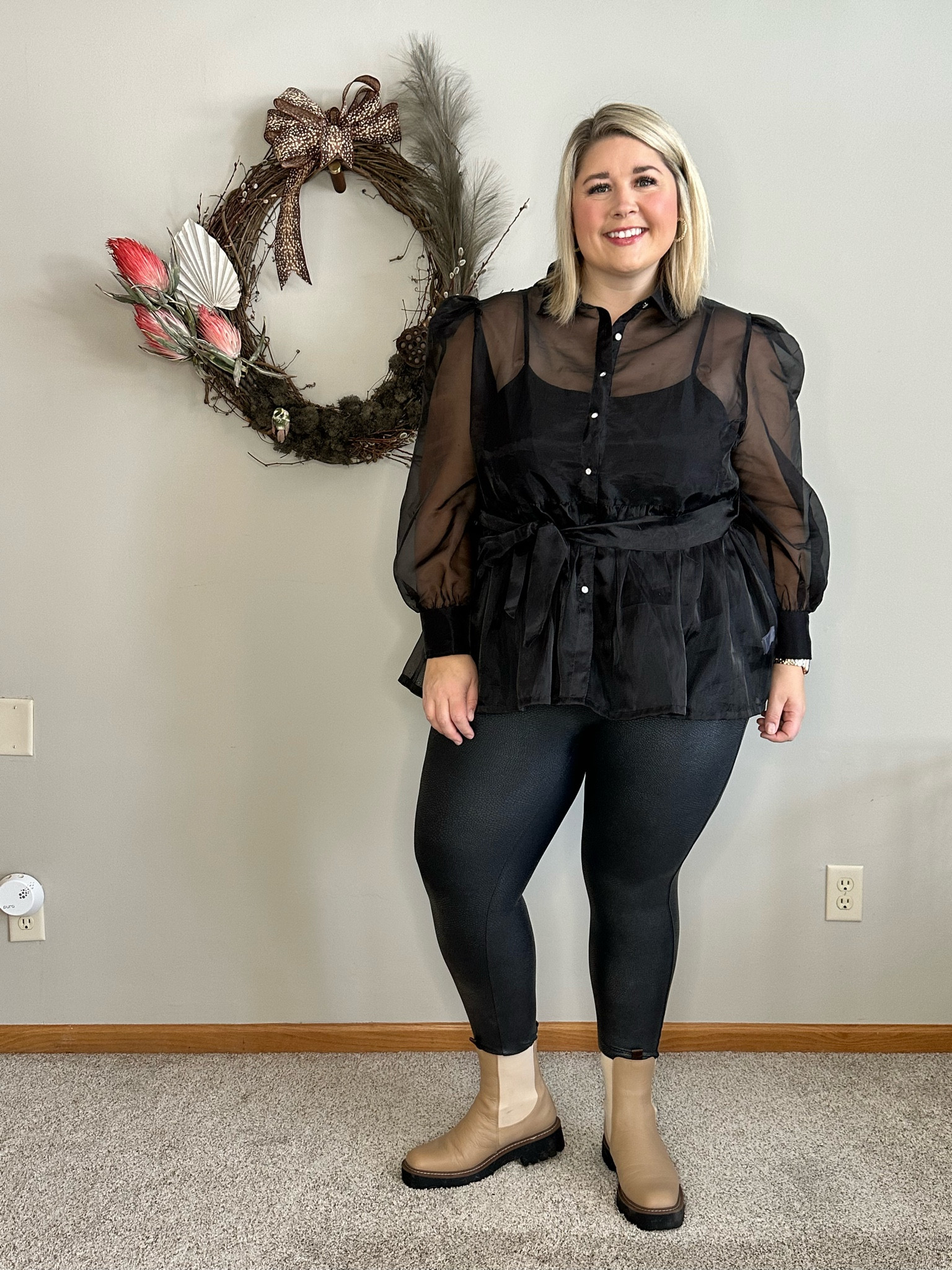 I chose my faux leather leggings and a statement fashion top for date night because it allows me to be comfy but still feel great and dressed up. The puff shoulder, embellished buttons and taffeta fabric of my top play into the romantic part of my style profile. Lastly, I chose the sesame colored boots for a pop of color against the black to break it up but allow me to walk with ease. 

#LTKcurves #LTKFind #LTKunder100