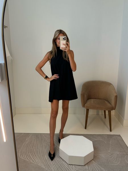 Cute little black dress - high neck with bow tie in the back 
