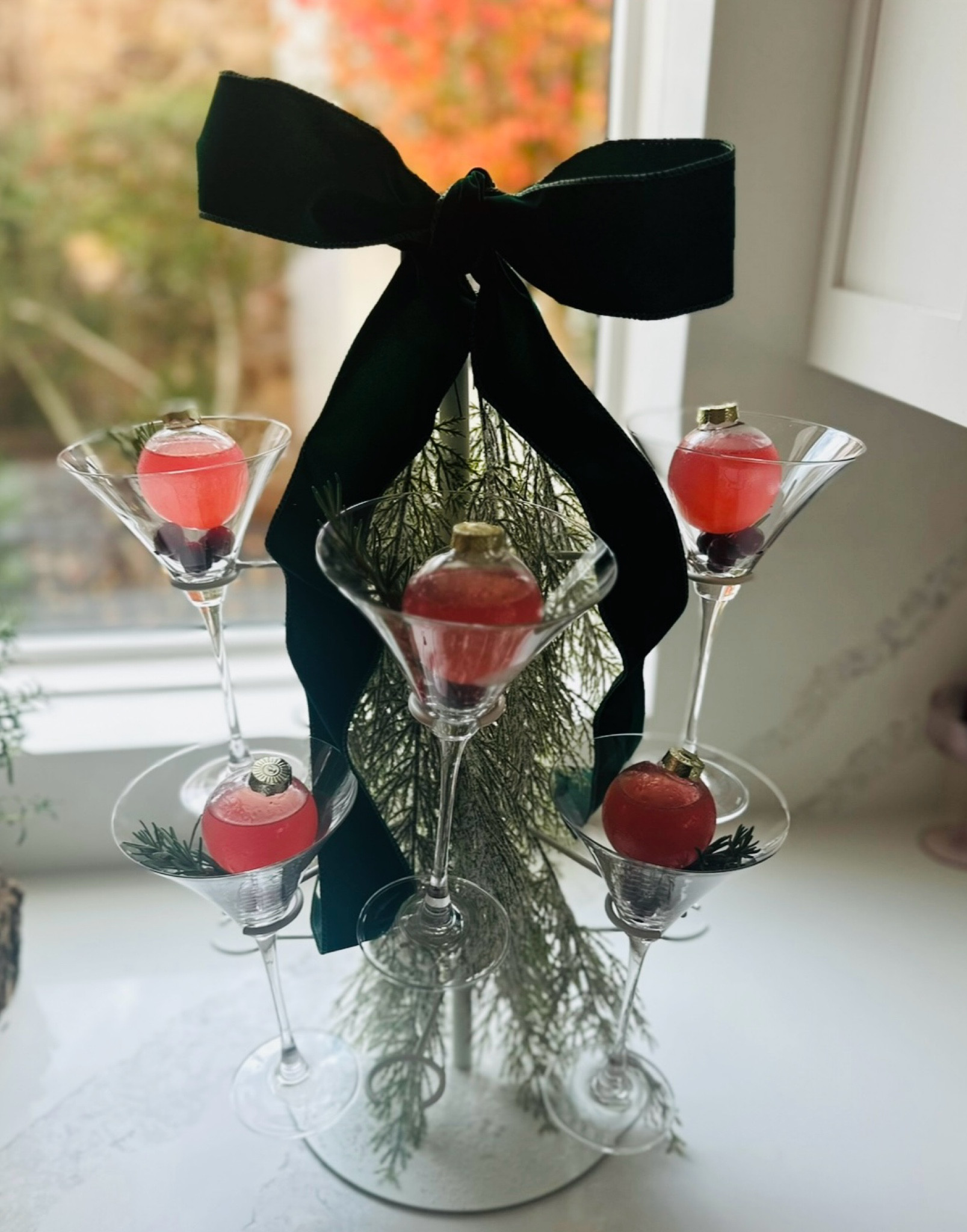 We love this martini tree! The cutest holiday decor for any party!🎄🎄We filled the ornaments with cosmos!❤️

#LTKHome #LTKHoliday #LTKSeasonal