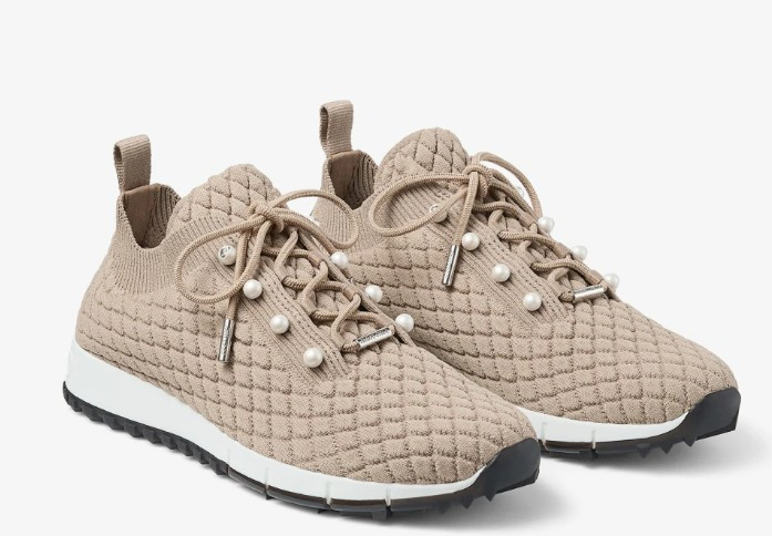 The designer sneaker that feels as elevated as it looks 🤍 The Jimmy Choo Veles knit trainers in Chai Cashmere Melange feature luxe knit construction with signature pearl button details, making them perfect for chic everyday outfits, travel days, and elevated casual looks.

#LTKStyle #LTKShoeCrush #JimmyChoo #LuxuryFashion #QuietLuxury #DesignerSneakers 

 #LTKSeasonal #LTKOver40 #LTKTravel