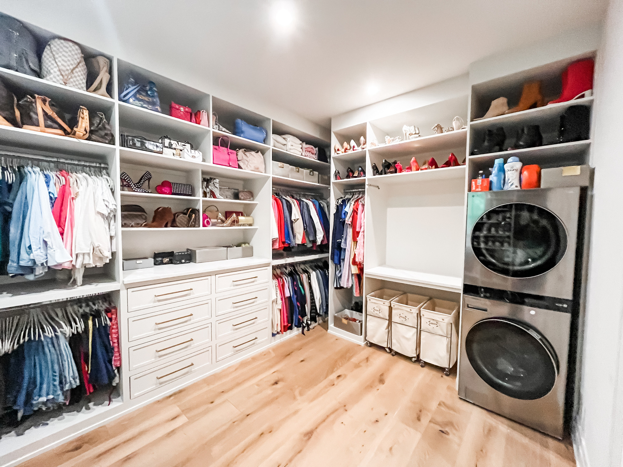 Putting off doing the laundry, folding it, and then putting it away is harder when your closet is organized and set up like this one. Having our favorite Steele laundry hampers at the ready makes it even easier too! 

 