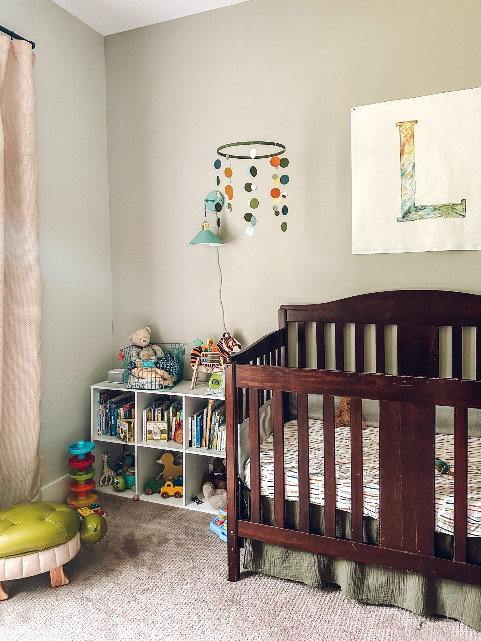 Colorful, cozy, and playful nursery decor (wallpaper still coming!) This playful corner was a happy, unplanned accident but it’s one of my favorite spots in this room. 

#LTKFamily #LTKBaby #LTKHome