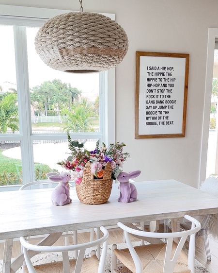 A fun fresh spring vibe in the kitchen. An easy transition with an Easter print (I know I know Rappers Delight is not an Easter print but it does say Hop)🐇😂 Filled an adorable bunny basket with flowers and voila Easter magic! #howihome #easterdecor #diydecor #LTKFind