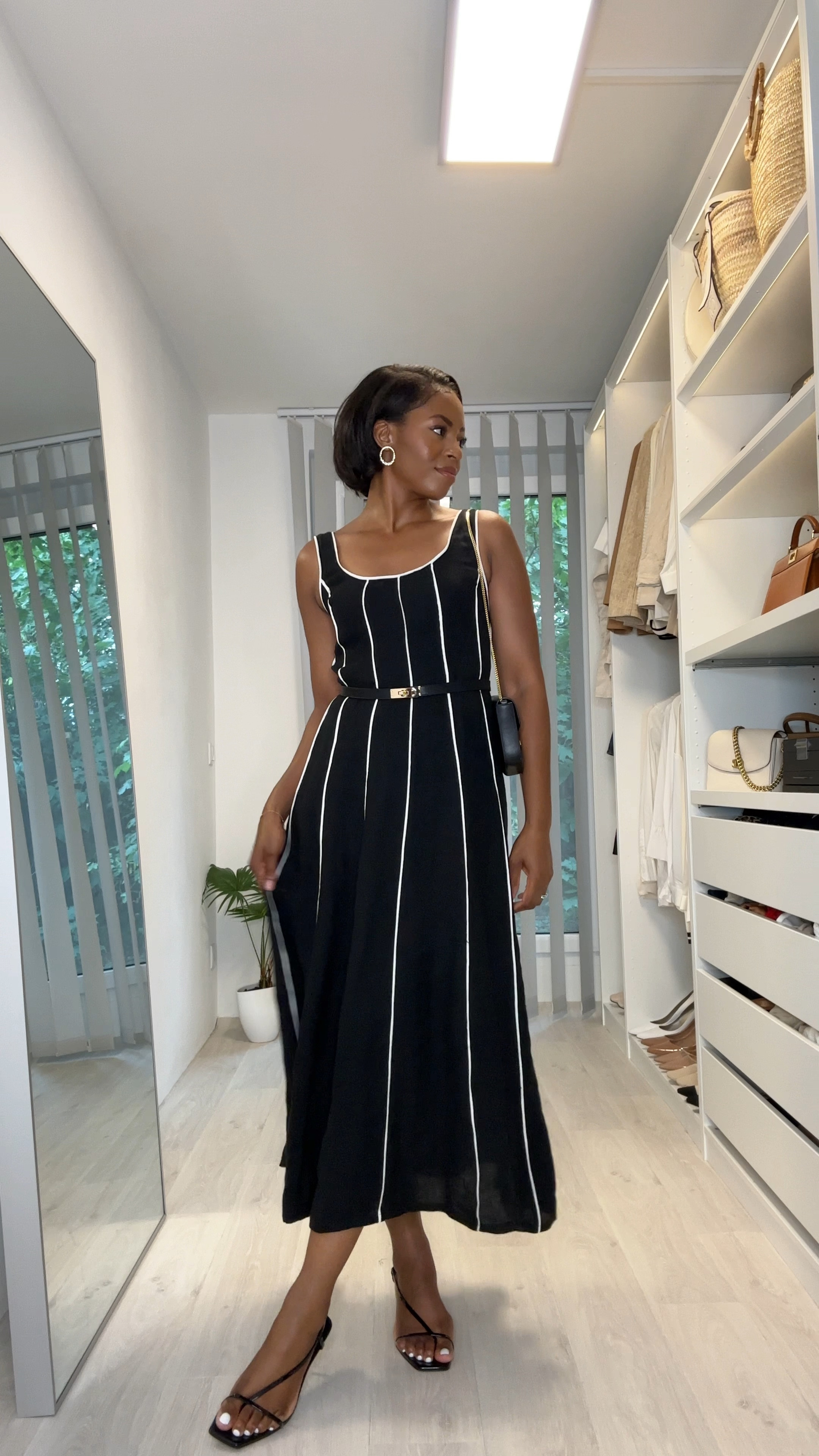 What to wear on a date |  Classic and captivating: A black and white dress that sets the tone for a flawless date night.

Dress @massimodutti (XS)
sandals @mango
Belt @amazonfashion
Bag @demellierlondon 


I linked similar or exact pieces for you! 💖

Follow my what to wear chronicels on instagram @edelbelar!


#LTKStyleTip #LTKVideo