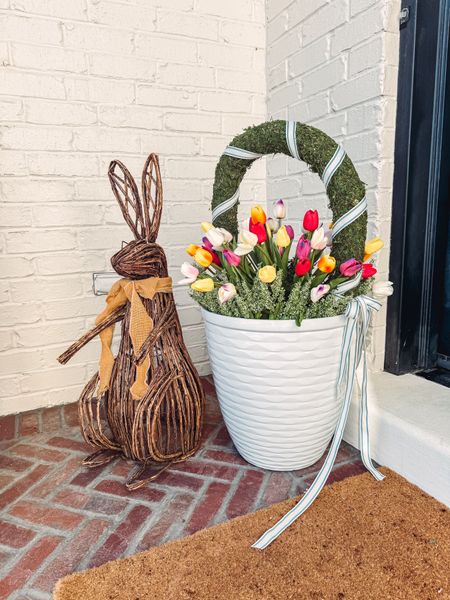 Cutest porch bunny made from grapevines. High and low option for you! Easter decor 
Easter porch
Spring porch 

#LTKSeasonal