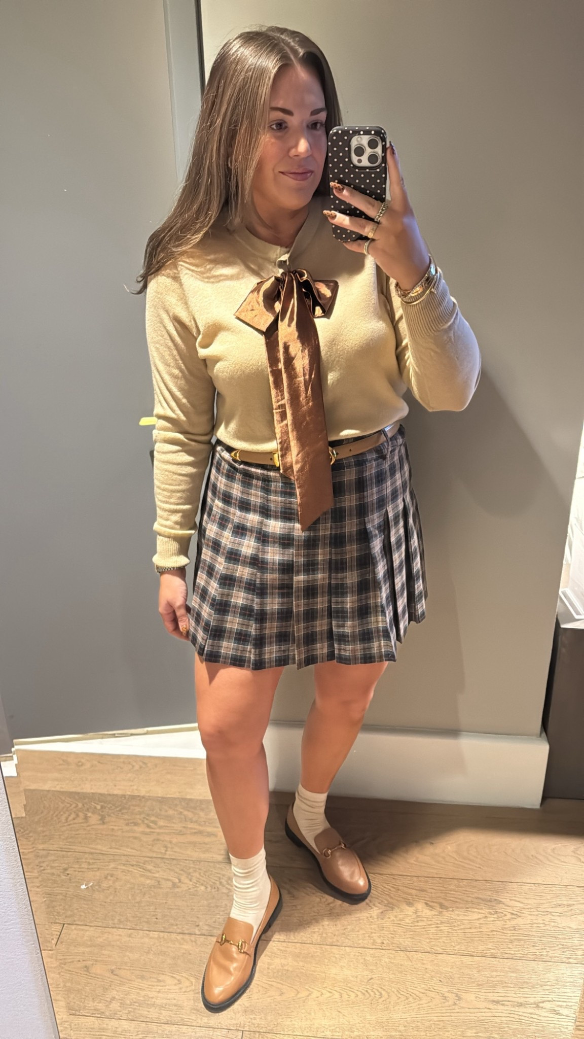 curvy midsize preppy look for fall! wearing size xl in bow sweater and pleated skirt 🤎 

#LTKMidsize #LTKSeasonal #LTKTravel