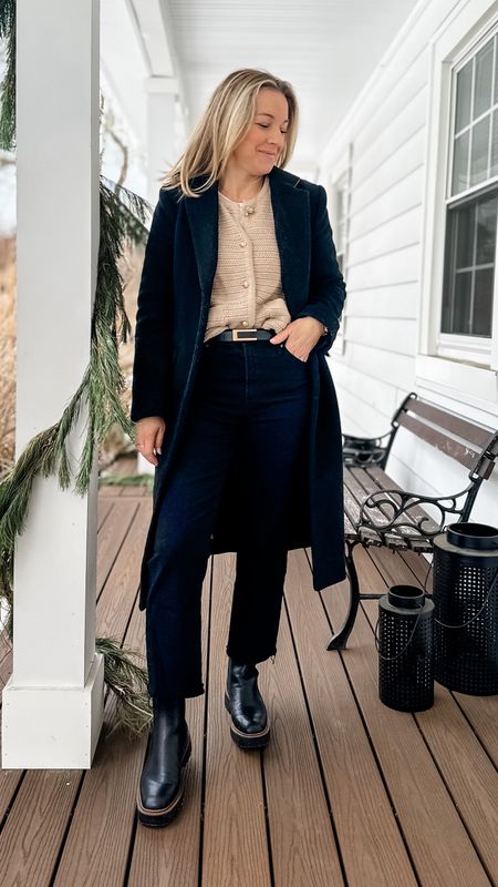 Loving this classically chic layered look. This cardigan is so beautiful with pretty chunky gold button and pockets. Wear it open or closed. I layered it over an ultra comfy and sleek white long sleeve top and tucked it all into some black jeans (that I cut). My Chelsea boots are my go to for snow bc they’re weatherproof and look polished and trendy! Small cardigan, medium tee, size 8 jeans, small coat  

#LTKworkwear #LTKMostLoved #LTKstyletip