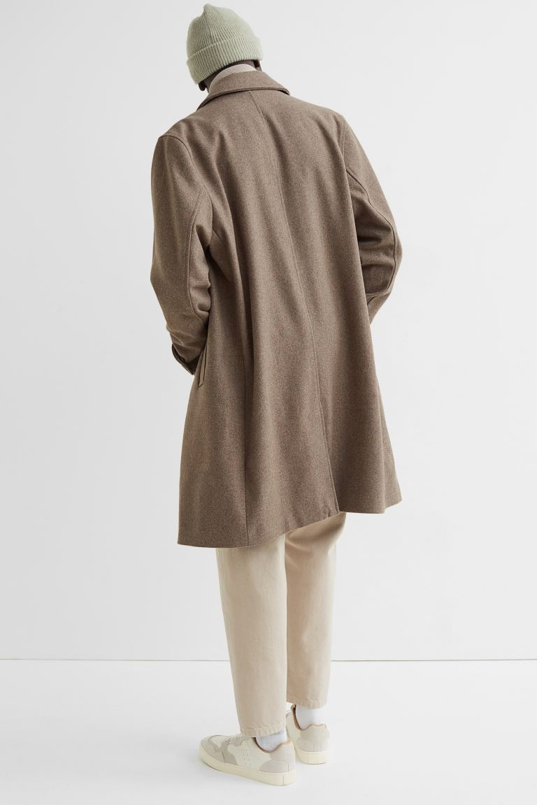 Car coat in woven, wool-blend fabric. Collar, concealed buttons at front, long sleeves, and adjus... | H&M (US + CA)