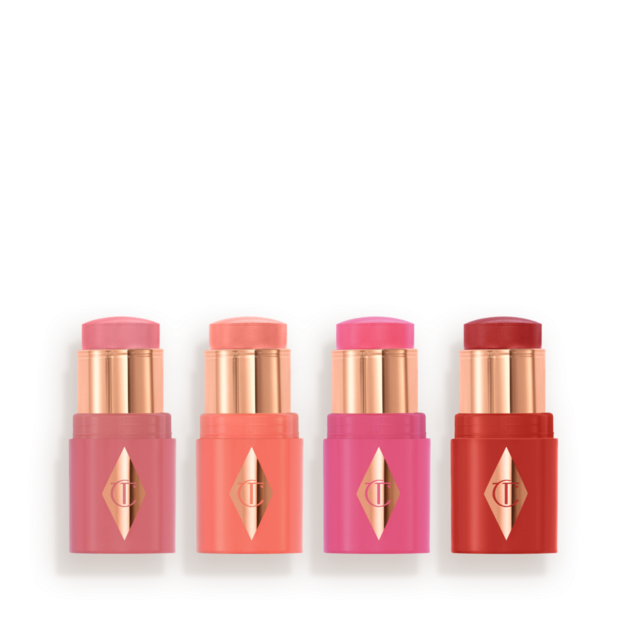 Mini Unreal Blush Quad: 4 Travel-sized Cream Blush Sticks | Charlotte Tilbury | Charlotte Tilbury (UK) 
