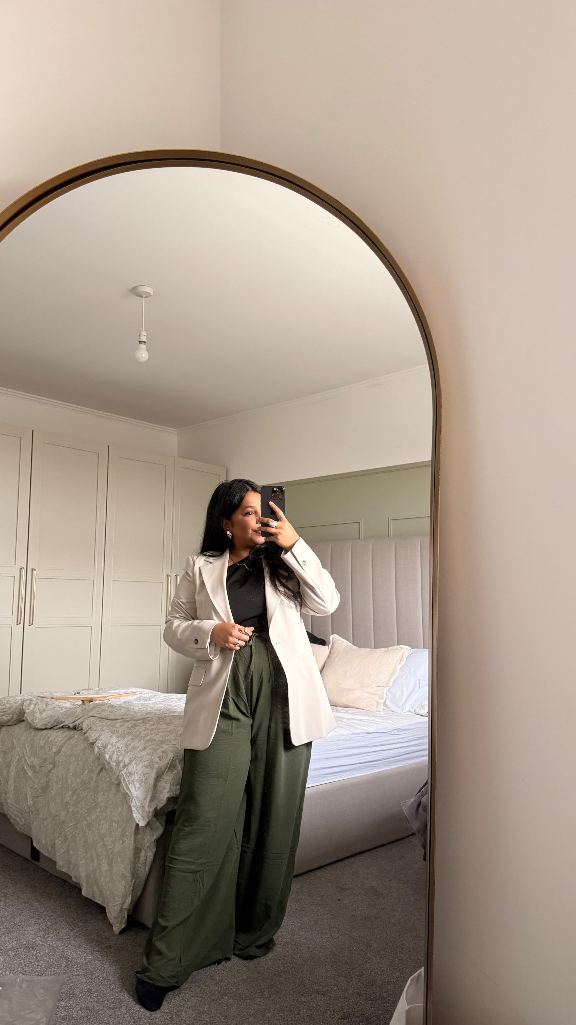 Off to a concert today 🎶 and went for my version of a semi-casual outfit (this is as casual as it gets for me 🤣).
I’ve tagged my neutral blazer from H&M — such a classic piece that goes with everything. Currently loving asymmetrical and one-shoulder tops that still work modestly under a jacket. The wide-leg trousers were a sweet gift from my sister, but I’ve linked some similar styles.
Had to add a little pop of colour — these green ones are just the right amount of bold 💚✨ 

#LTKworkwear #LTKautumn #LTKmodest