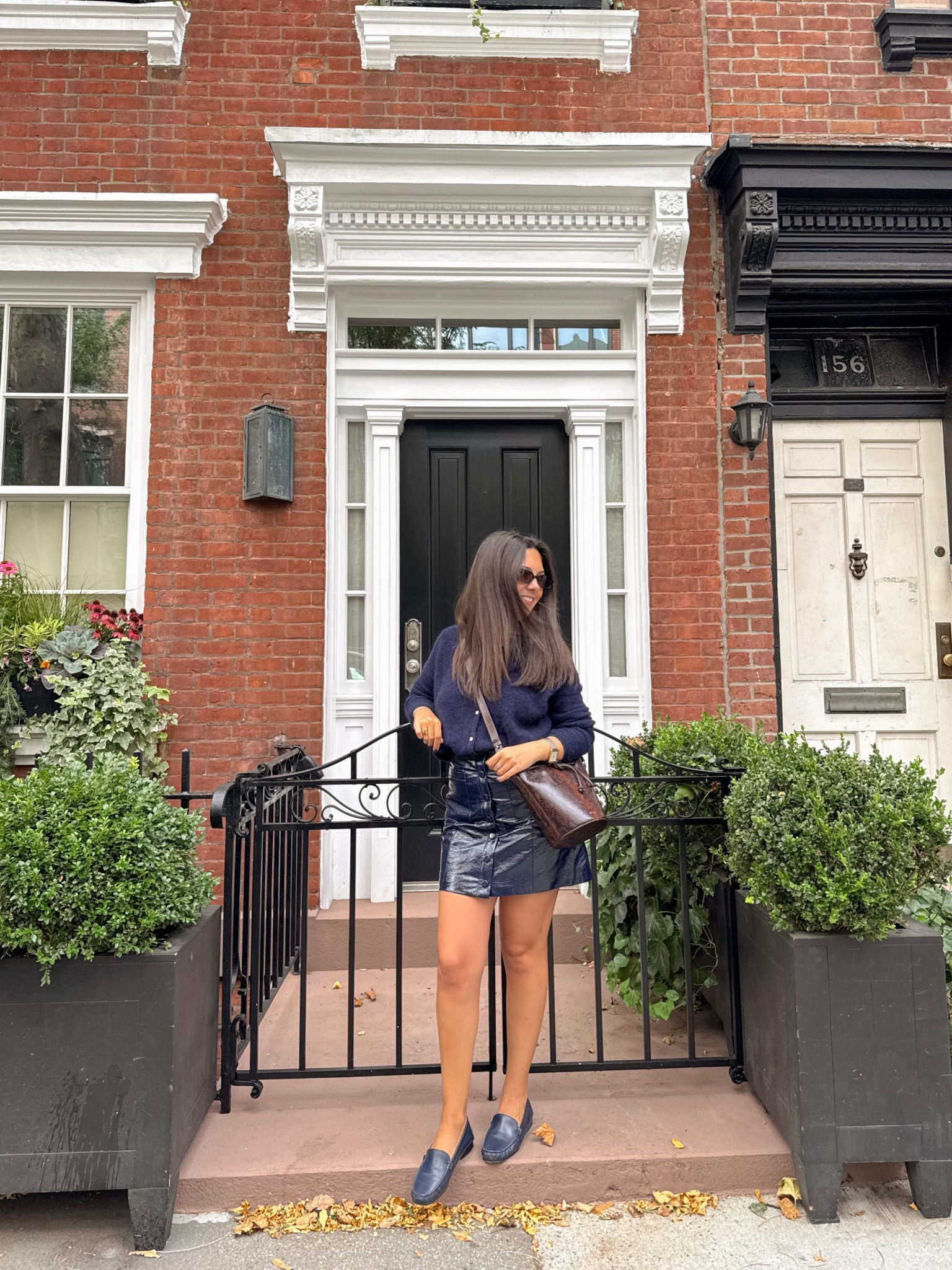 Navy on navy 🖤 styled this cozy navy cardigan with a faux patent leather mini skirt for an effortless fall outfit that’s equal parts chic and wearable. I finished the look with classic loafers and a structured shoulder bag — perfect for a polished NYC day look.

#LTKItBag #LTKSeasonal #LTKStyleTip