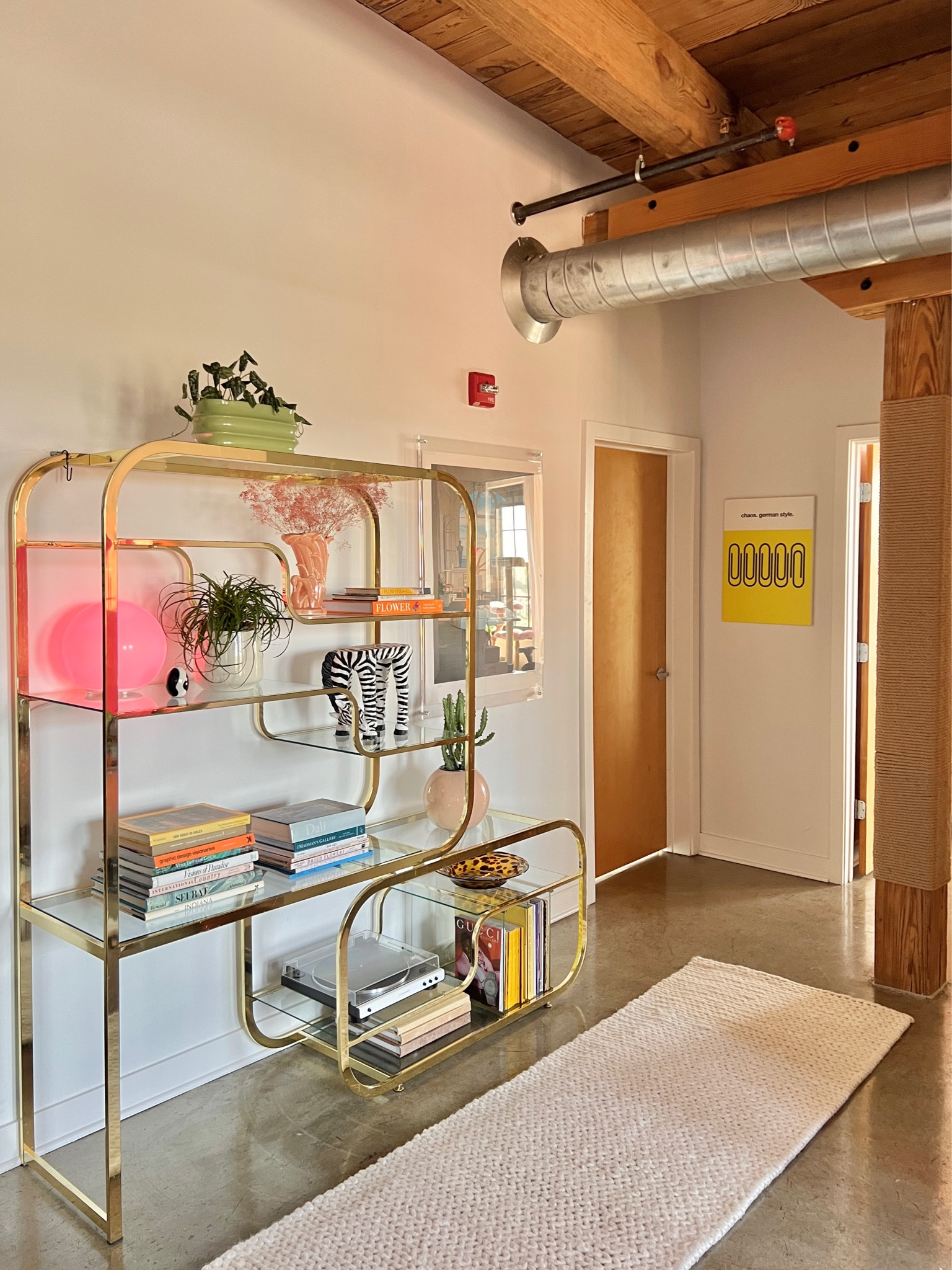 funky and vintage home decor styled with some modern and colorful finds. here’s a little look at my hallway with my stunning thrifted brass etagere.💝

#LTKhome #LTKunder100 #LTKFind