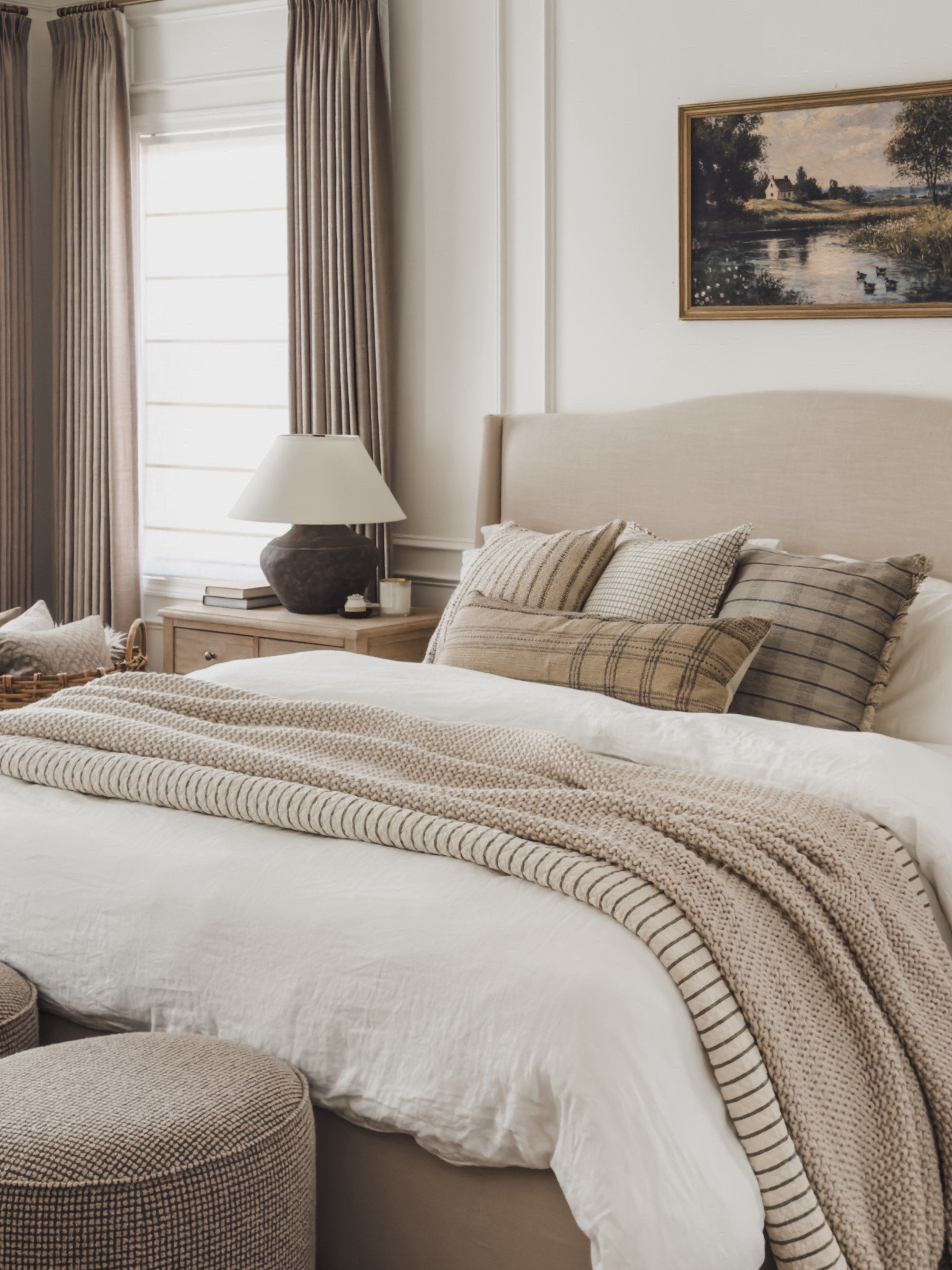Cozy, collected bedding refresh with all the layers and texture! By investing in quality pieces that I don’t always have to swap out, it creates for a simple refresh with seasonal pillows, throw blankets, and an easy art swap.

Home finds, neutral home inspo, primary bedroom refresh, cozy bedding, collected style, timeless bedroom inspo, cozy layers, neutral throw blanket, table lamp, upholstered bed frame, linen bedding, seasonal art, pinch pleat curtains, wainscoting detail, ottoman favorites, roman shades, linen curtain, Two Pages, Wayfair, Pottery Barn style, Quince, Loloi, Amber Lewis, Etsy, Target style, shop the look!

#LTKSeasonal #LTKHome