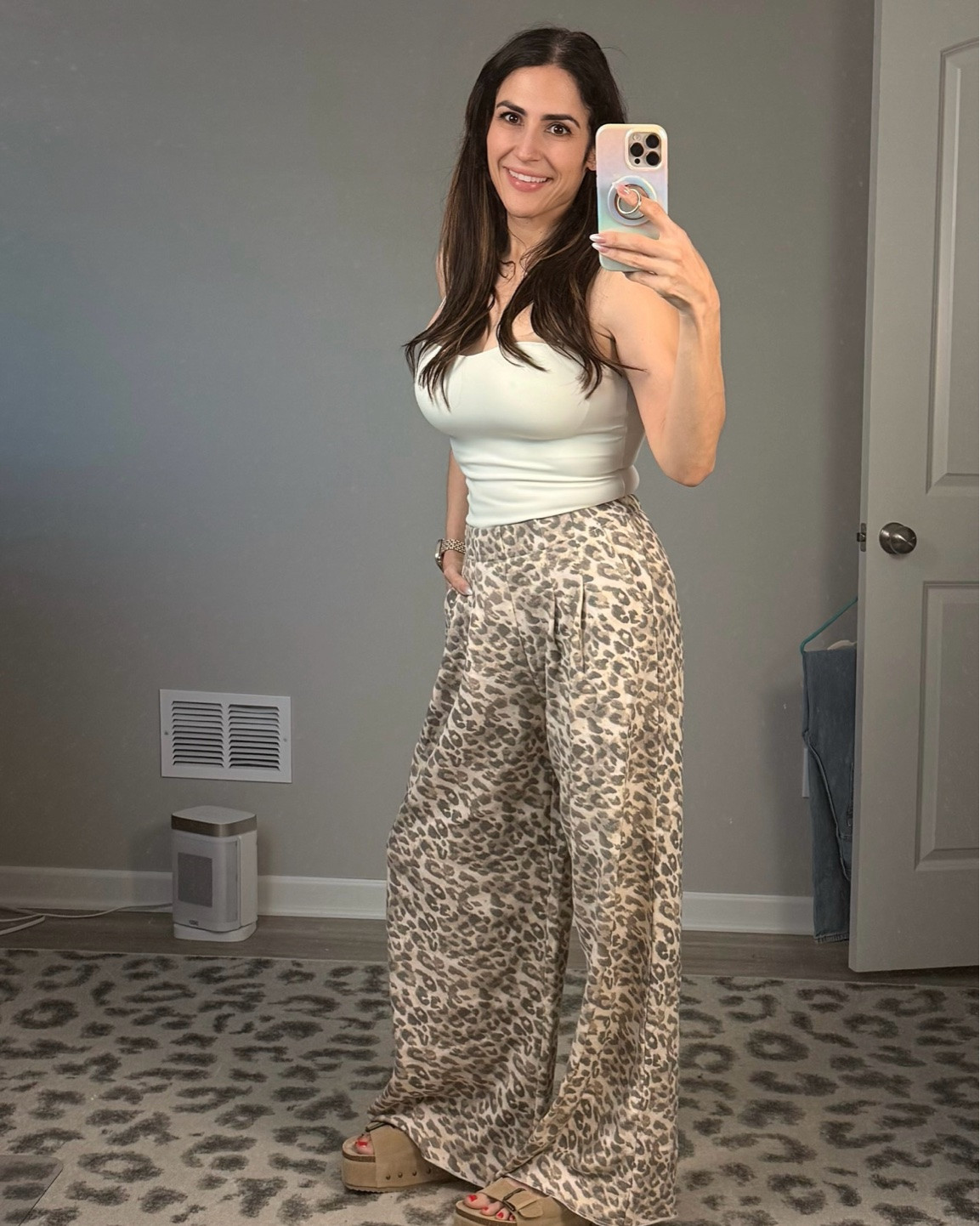 Neutral summer outfit I can't stop reaching for 🤍

These leopard wide leg pants are lightweight, comfortable, and so easy to style with a simple tank and platform sandals.

Perfect for summer outfits, travel outfits, and casual weekend plans.

I’m wearing the XS regular here with platforms, but I also have the XS short for flat sandal days 😉

@Aerie

#LTKootd #LTKOver40 #LTKSeasonal