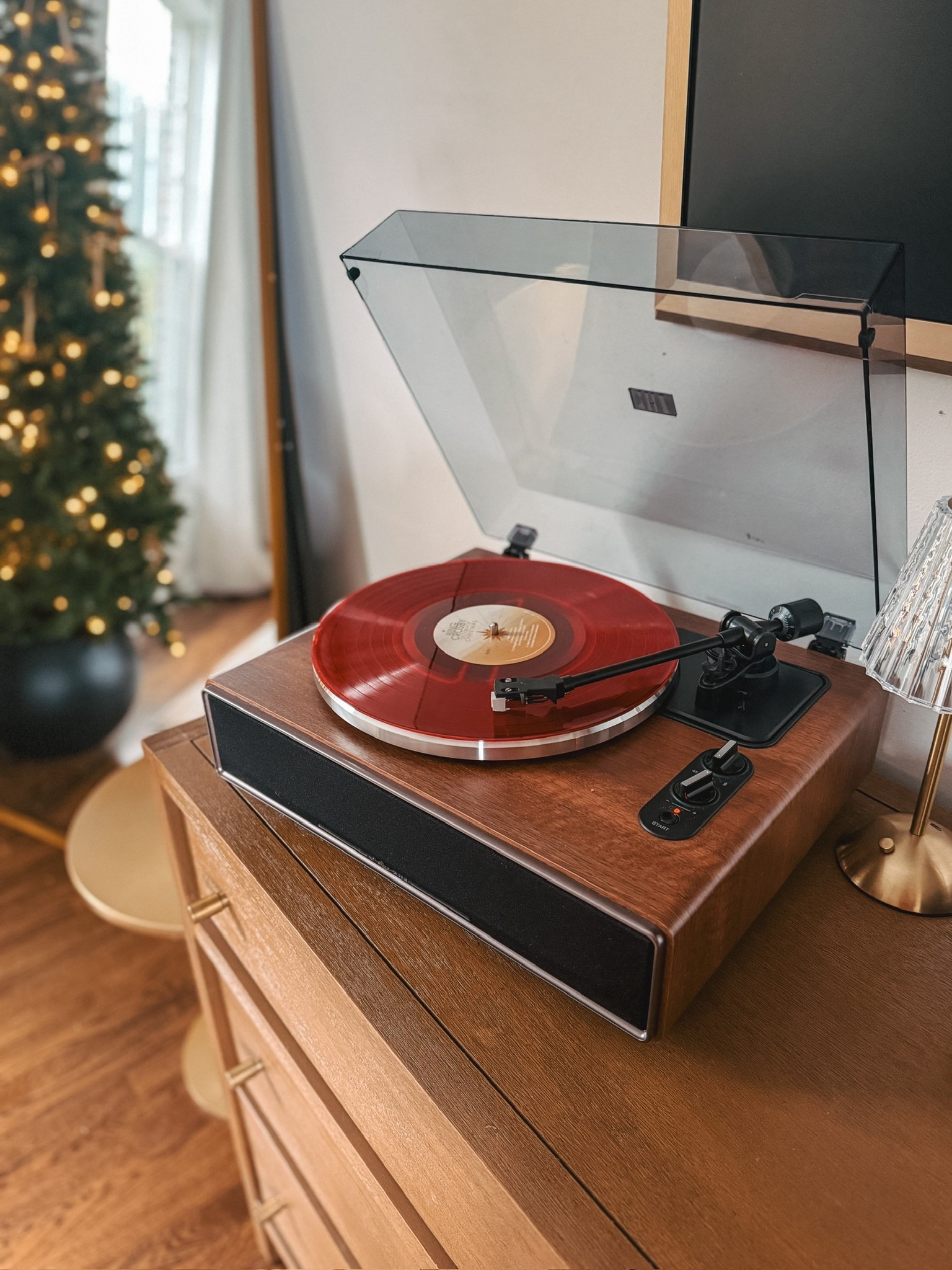 We have been loving this table top vinyl record player. It looks so nice and sounds amazing! A fun gift idea for anyone!

#LTKMens #LTKHoliday #LTKGiftGuide