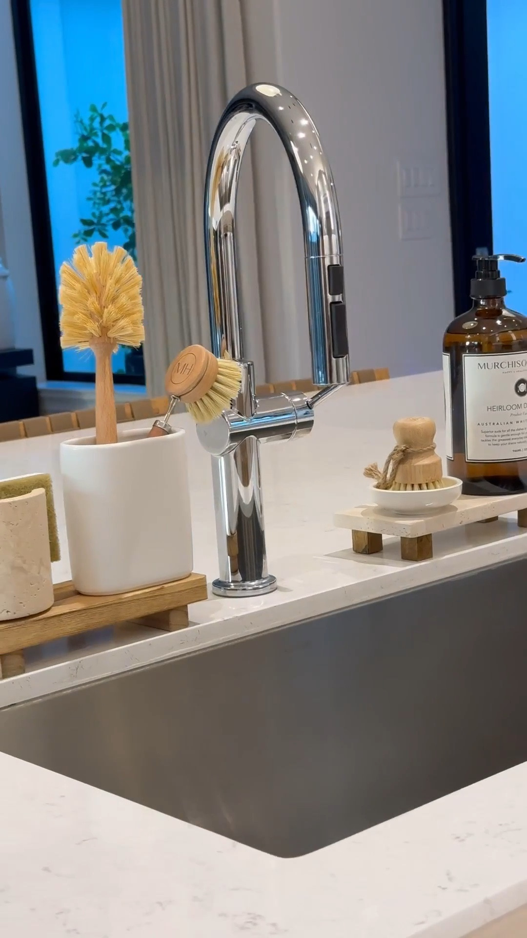 Kitchen Sink Essentials: 

Wooden & travertine risers 
Dish sponge holder 
Brush holders
Glass, pot, and dish brushes
Dish soap 


#LTKSaleAlert #LTKStyleTip #LTKHome