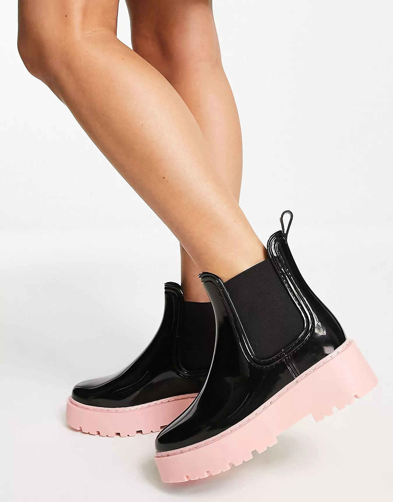 ASOS DESIGN Gadget chunky chelsea wellies in black with pink sole | ASOS (Global)