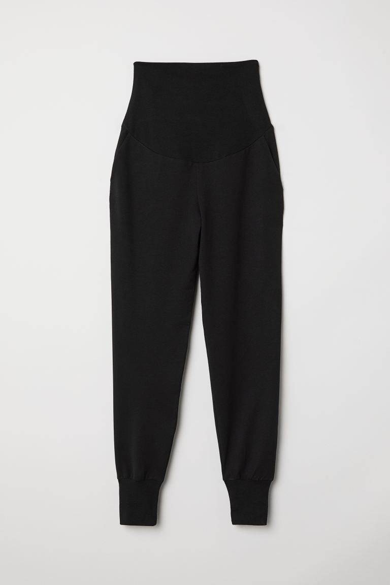 Lightweight sweatpant joggers with a wide panel at top, side pockets, and foldover cuffs at hems. | H&M (US + CA)